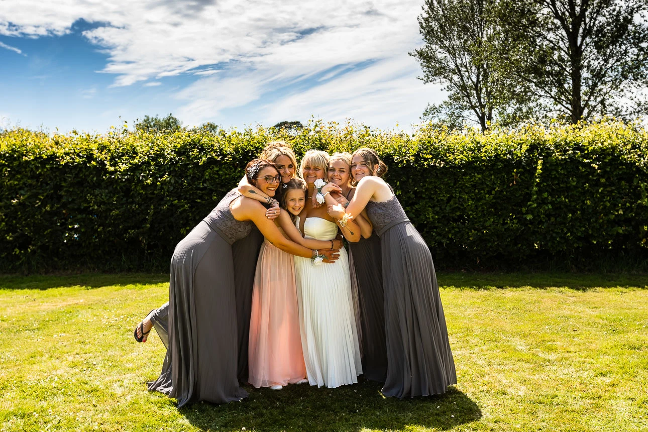 bride and bridesmaids at exmouth country lodge wedding venue