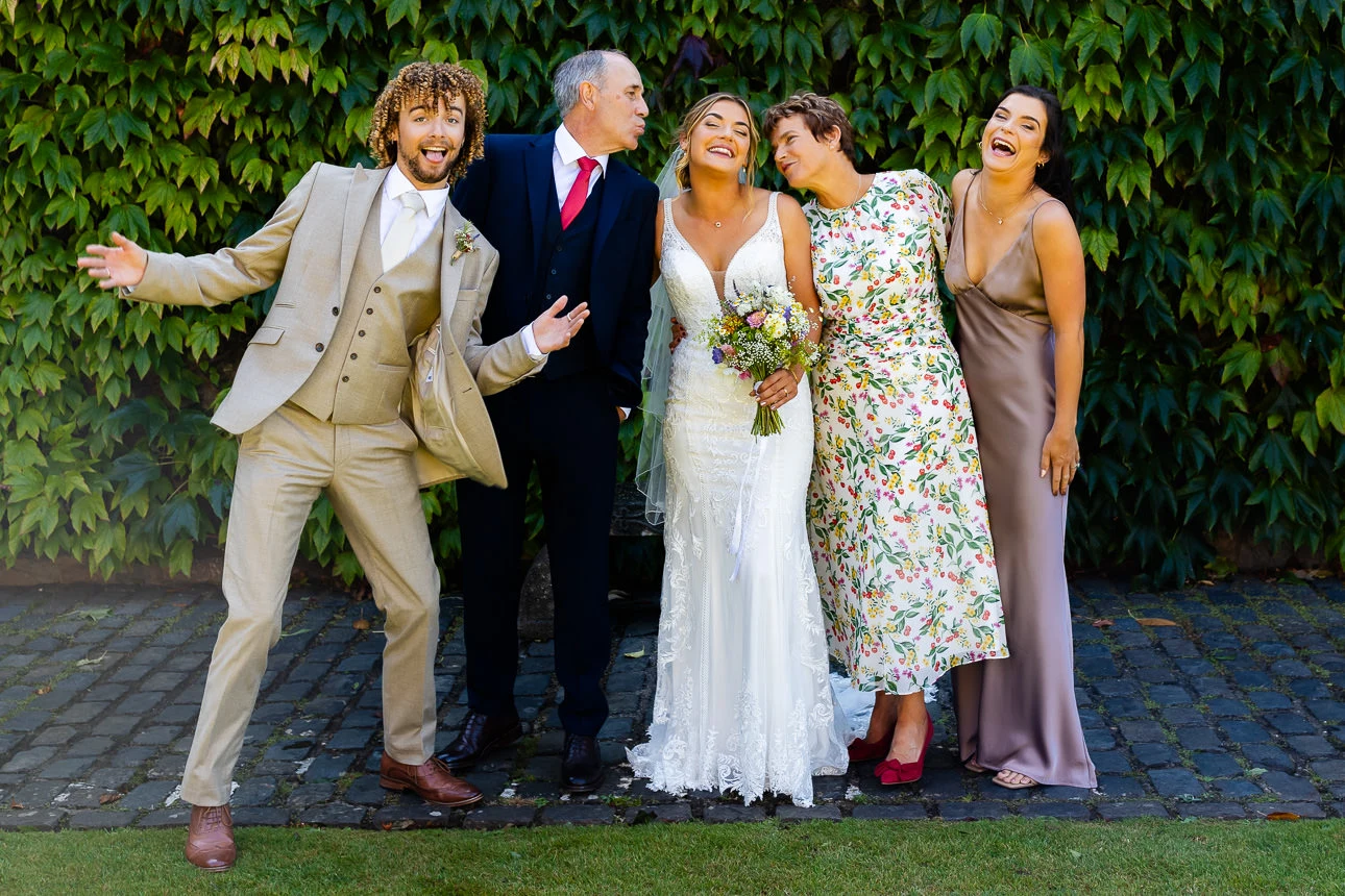 bride with family at Walton castle wedding venue