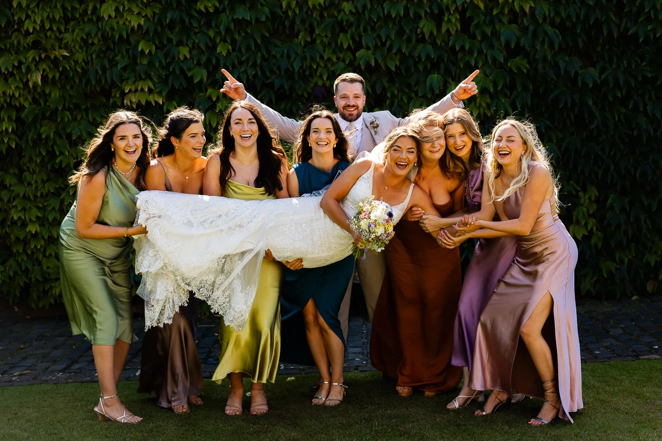 bride, groom and bridesmaids at Walton Castle Wedding venue